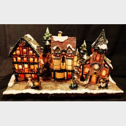 Vintage juleby med elektrisk lys