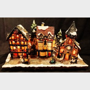 Vintage juleby med elektrisk lys