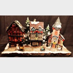 Vintage juleby med elektrisk lys