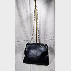 Sort vintage skindtaske med guldk�de