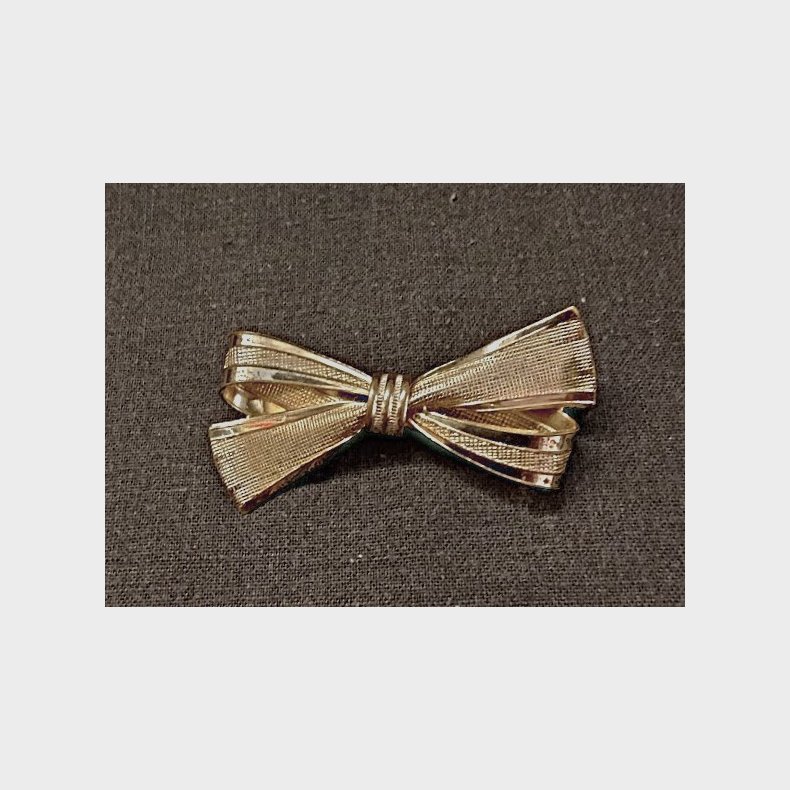 Vintage broche med sl�jfe