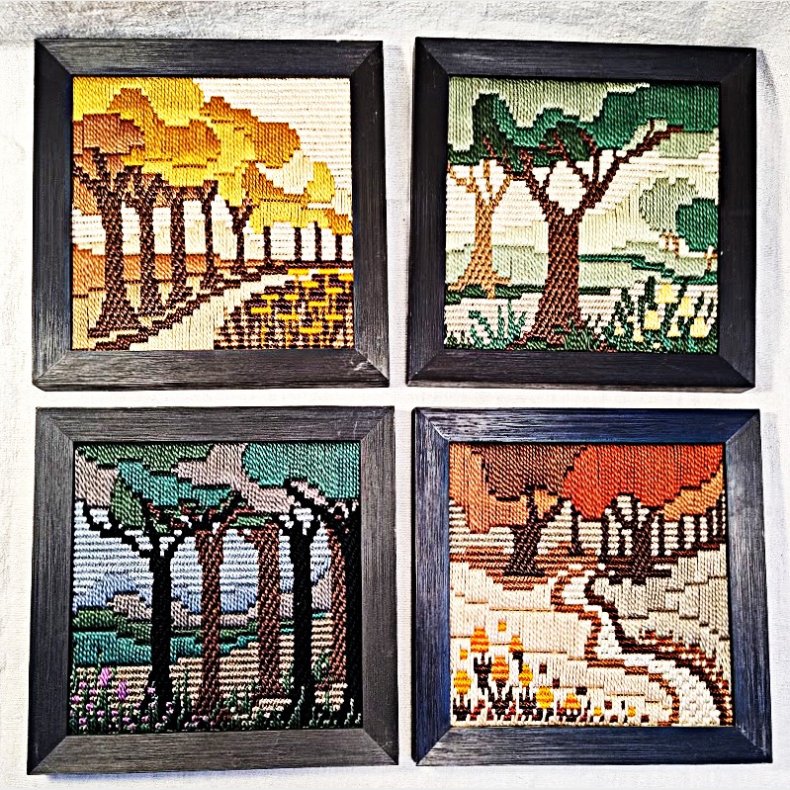 Broderede vintage billeder i rammer