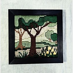 Broderede vintage billeder i rammer