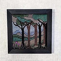 Broderede vintage billeder i rammer